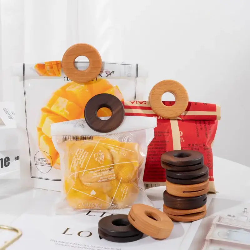 Wooden black walnut donuts bag clips by decorbites in natural and dark brown tones for kitchen sealing use
