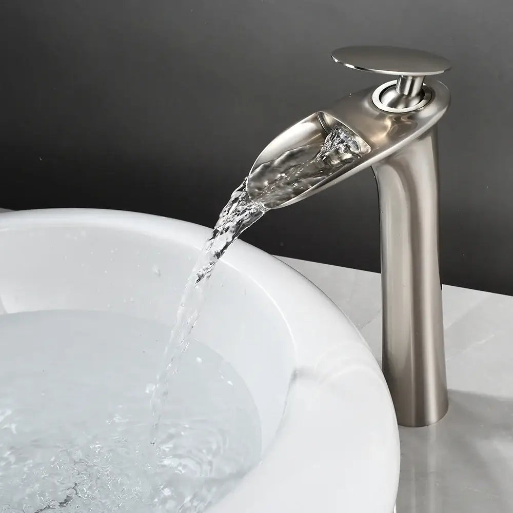 DecorBites™ black stainless steel bathroom faucet with a sleek modern waterfall design for basin faucets use