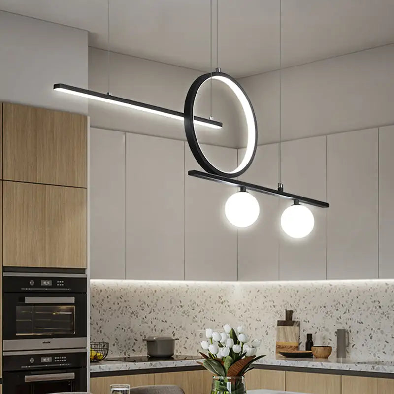 Modern black metal suspension light with circular ring and two spherical bulbs for dining room illumination