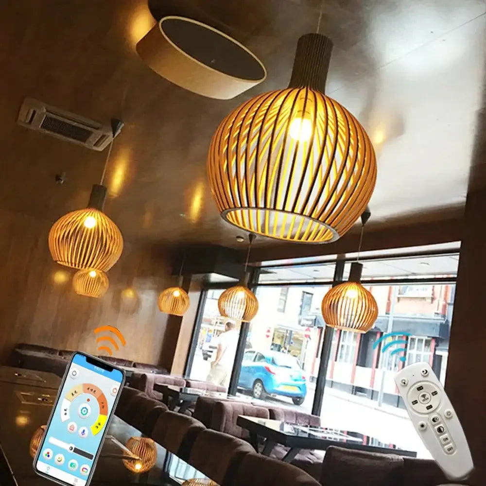 Warm-toned woven bamboo pendant light with spherical design and vertical slats for decorbites black wood cage chandelier