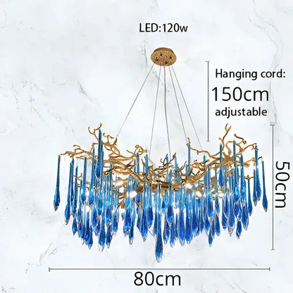 Decorbites blue crystal chandelier with blue glass and gold-toned metal branches for dining room lighting