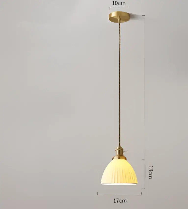 Vintage-style pendant light with brass-finished frame and cream ribbed glass shade for decorbites blue glass pendant light
