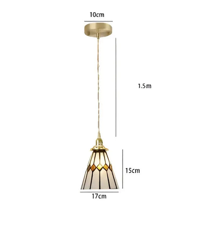 Gold-toned pendant light with stained glass shade featuring amber cream geometric patterns for dining room decorbites blue glass pendant lights