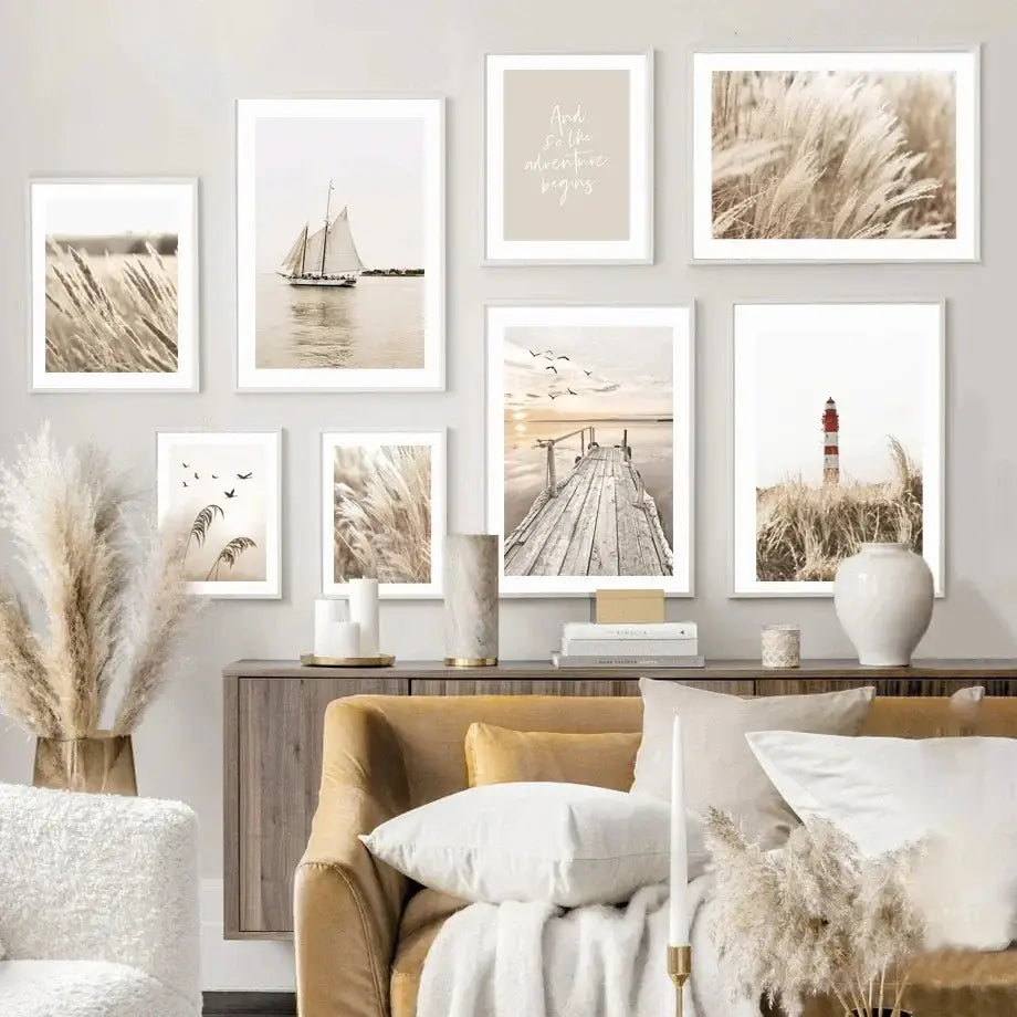 A collection of nine white-framed decorbites™ bohemian beach landscape wall art prints in beige and neutral tones