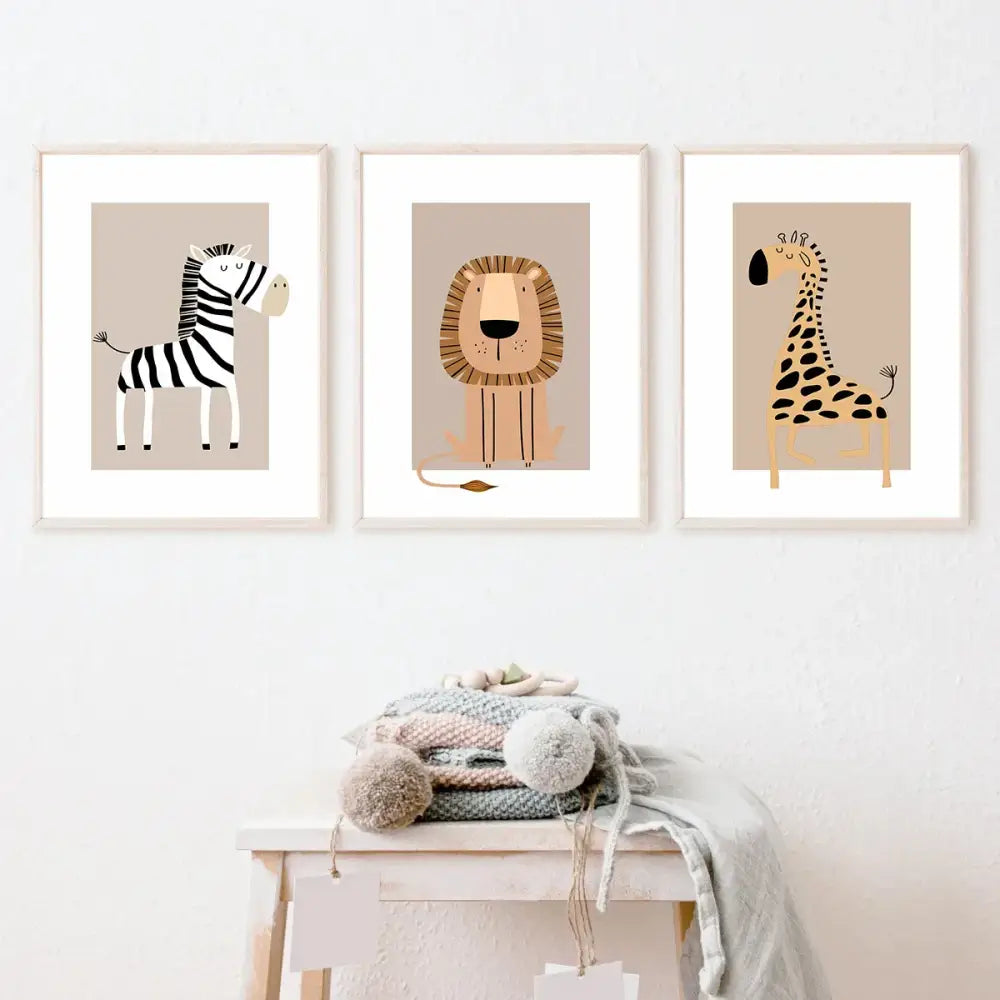 Set of three framed bohemian jungle animal toddler canvas prints featuring zebra lion and giraffe minimalist forest art room decor
