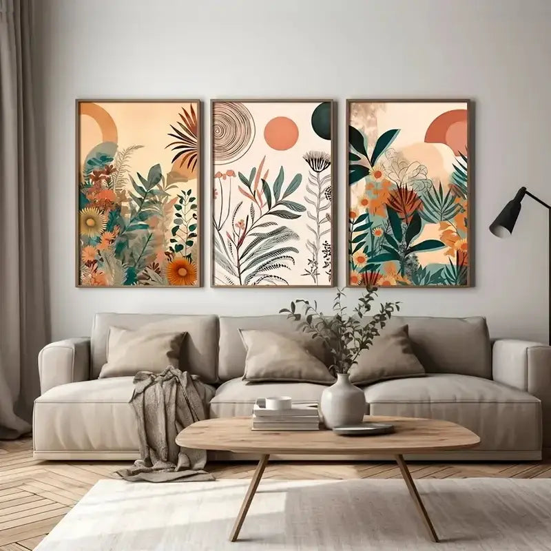 Set of three framed boho floral modern canvas art prints with vibrant orange green and earth-toned abstract motifs
