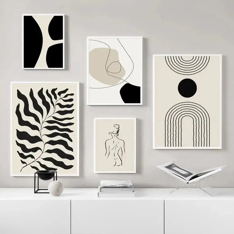 Set of five boho geometric line canvas wall art prints with black and beige minimalist abstract drawings in white frames