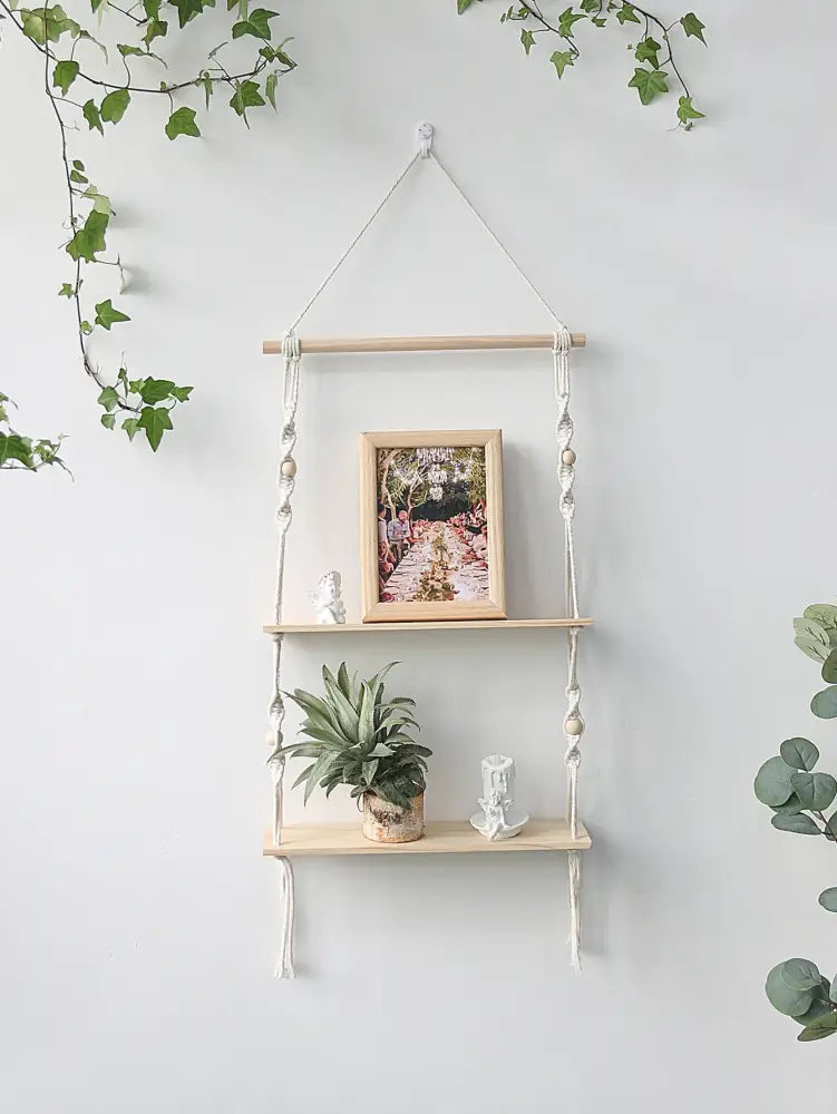 Decorbites™ boho macrame wall shelf with two light wood shelves and white braided cords with wooden beads for home decor