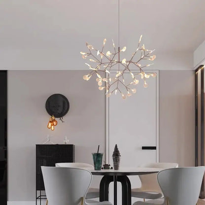 A modern decorbites branch design nordic chandelier with warm bulbs and rose gold black metallic frame