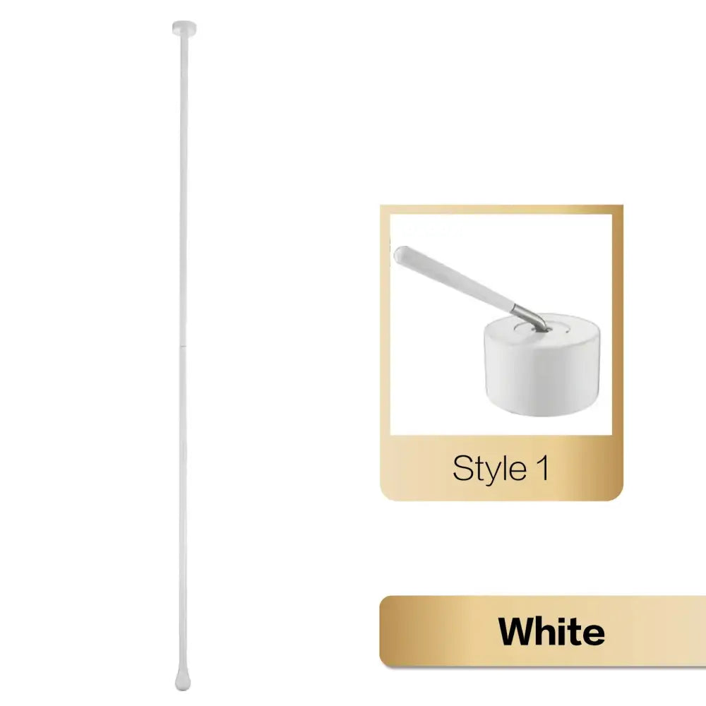 White sleek extendable shower rod with minimalist design and matching end cap used with brass black single handle faucet