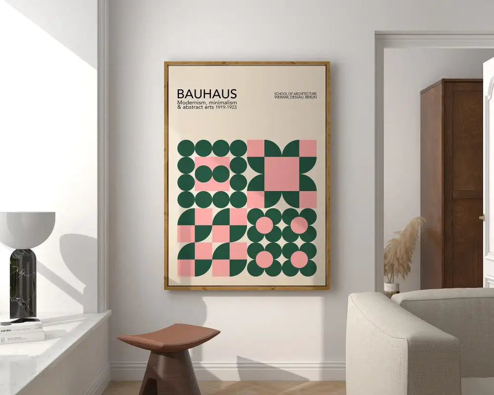 A framed DecorBites™ bright geometric wall art canvas print with green and pink design in light wood frame