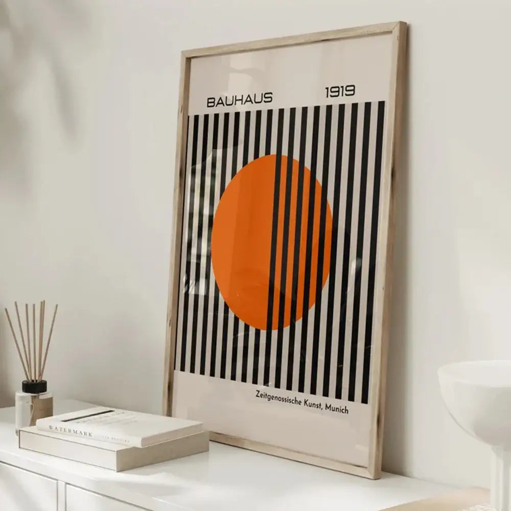 DecorBites™ bright orange canvas painting with bold black stripes and bauhaus 1919 text for modern home decor