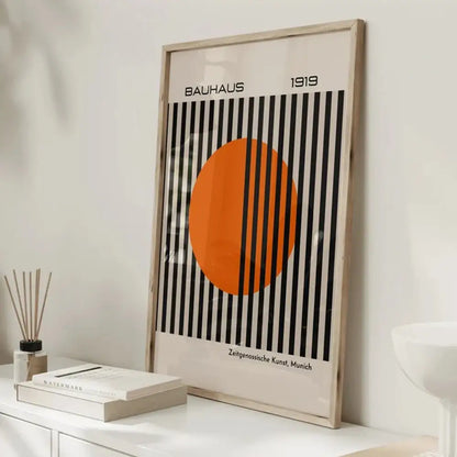 DecorBites™ bright orange canvas painting with bold black stripes and bauhaus 1919 text for modern home decor
