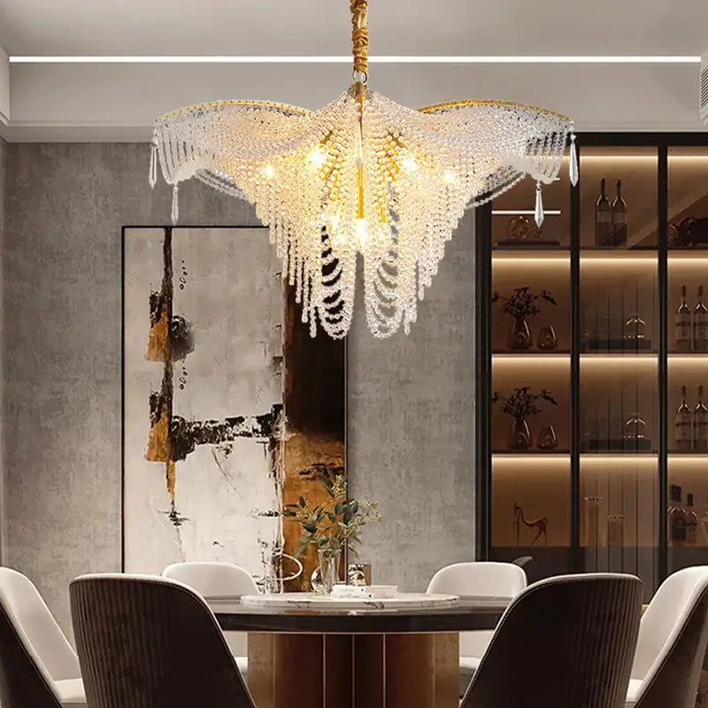 A decorbites butterfly crystal bead large gold chandelier with cascading crystal droplets and wing-like design for living room