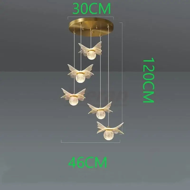 Gold-toned butterfly led chandelier pendant light with clear glass globes by decorbites for bedroom lighting