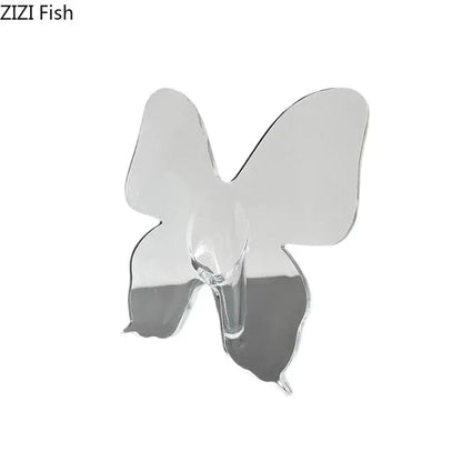 Clear transparent butterfly-shaped adhesive hook with minimalist design for DecorBites™ butterfly vase aesthetic room decor