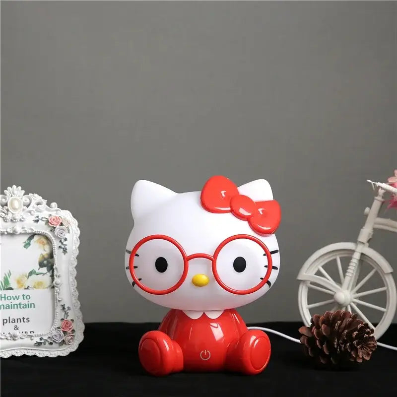 White and red hello kitty decorbites cartoon animal led night light with round glasses and glossy plastic finish