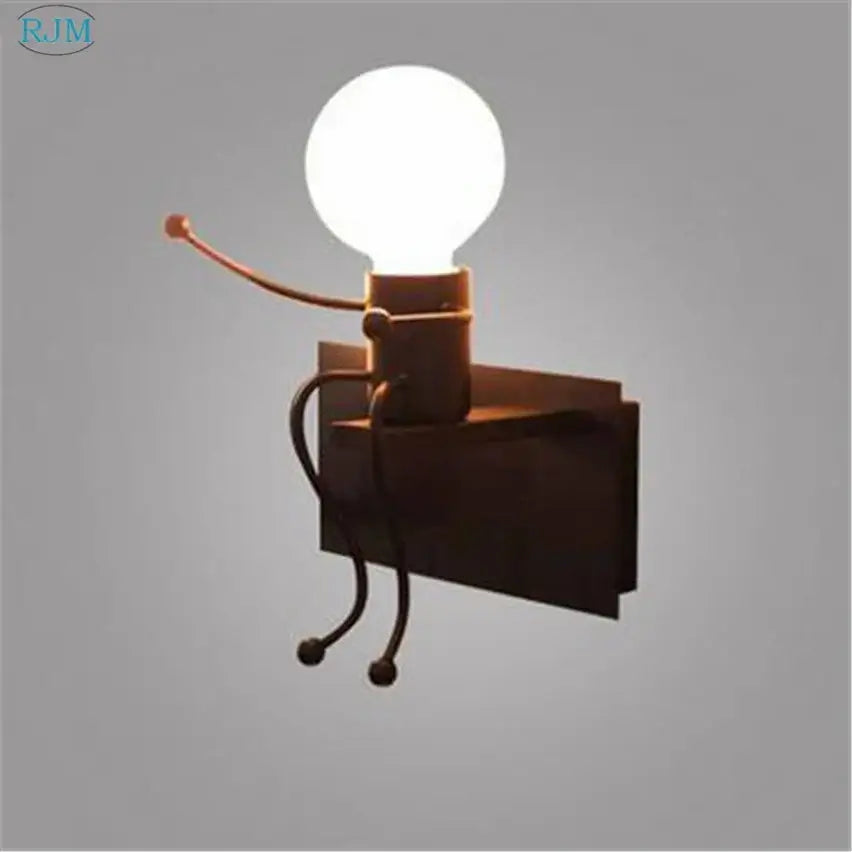 Rustic metal robot-shaped decorbites cartoon children iron wall lamp with glowing white bulb for bedroom decor