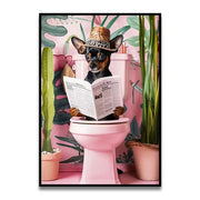 DecorBites™ canvas wall art featuring a black and tan chihuahua in a straw hat reading a newspaper on a pink toilet