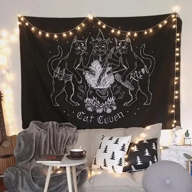 Black cat coven tapestry featuring white line-art cats around a cauldron with string lights for decorbites cat witchcraft black rose wall hanging