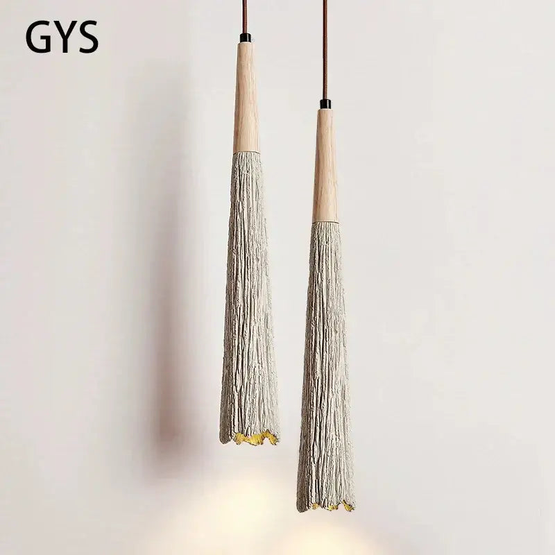 Two gys brand decorbites cement cream led pendant lights with wooden tops and grayish beige tassel bodies for bedside use
