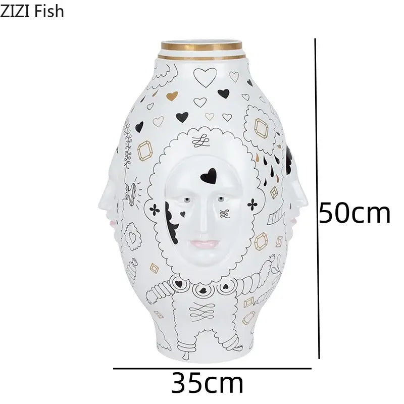 DecorBites™ ceramic vase desktop with white ceramic featuring black and gold whimsical face design for floral arrangements