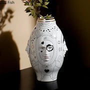 Decorbites™ ceramic vase desktop featuring white ceramic with gold rim and intricate black line art for floral arrangements