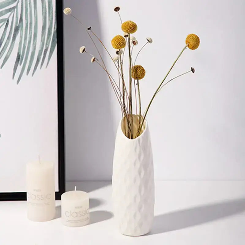 White ceramic-look plastic vase imitation with textured diamond pattern from decorbites for home and garden use