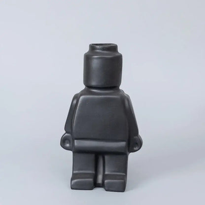 Black ceramic robot vase shaped like a lego minifigure from decorbites™ nordic style home decor collection