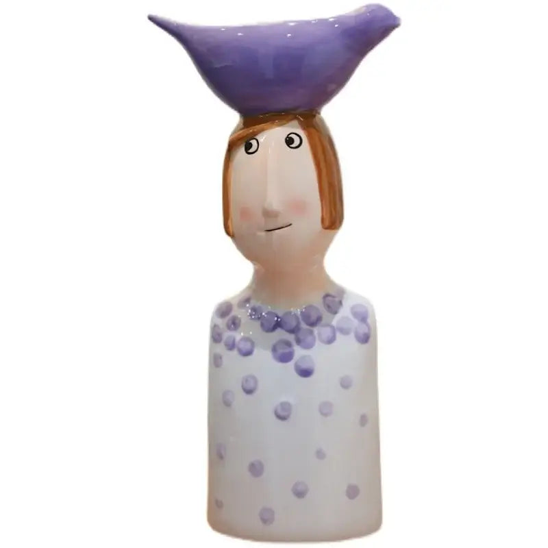 Whimsical decorbites™ ceramic vase set featuring a woman figurine in white dress with purple polka dots and bird for home decor