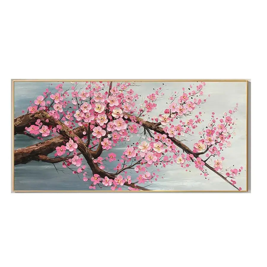 A framed DecorBites™ cherry blossom canvas featuring pink flowers on a branch for modern living room decor