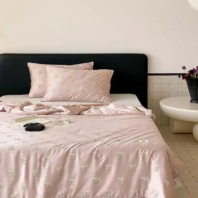Pink satin bedding set with light gray elephant pattern featuring decorbites cherry lyocell fiber cooling blanket