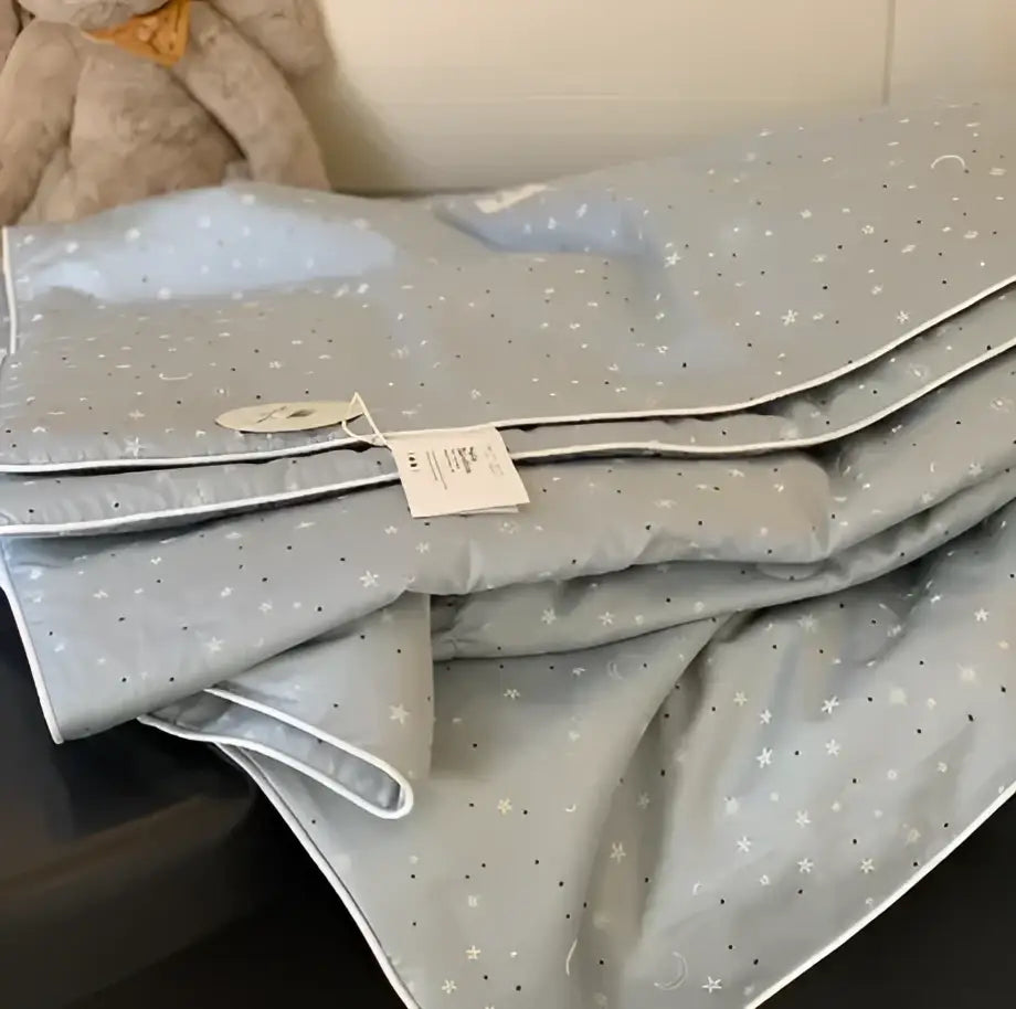 Decorbites cherry lyocell fiber cooling blanket in gray star pattern with white stitching and soft plush texture for children adults