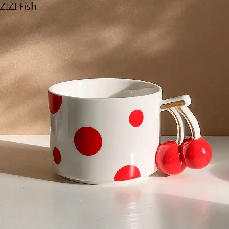 White ceramic decorbites cherry porcelain mug with bold red polka dots and cherry-shaped handle for coffee or tea
