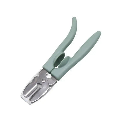 Light green plastic handled chestnut cracker scissors with metallic silver cutting head for cracking nuts by decorbites