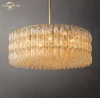 Gold-toned DecorBites chiara clear modern chandelier with cascading tiers of faceted clear glass crystals for living room