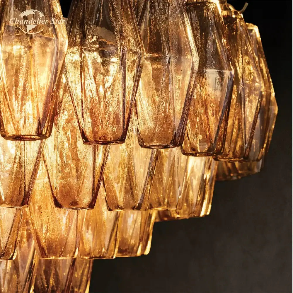 Decorbites chiara smoke glass tiered chandelier with golden faceted glass and textured amber-hued finish