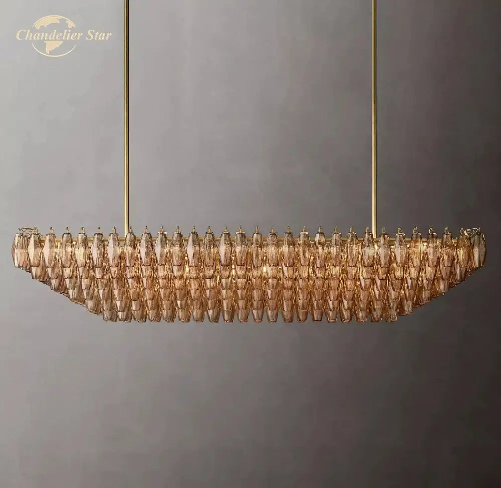 Gold-toned decorbites chiara smoke glass tiered chandelier with modern elongated design and faceted amber glass pieces