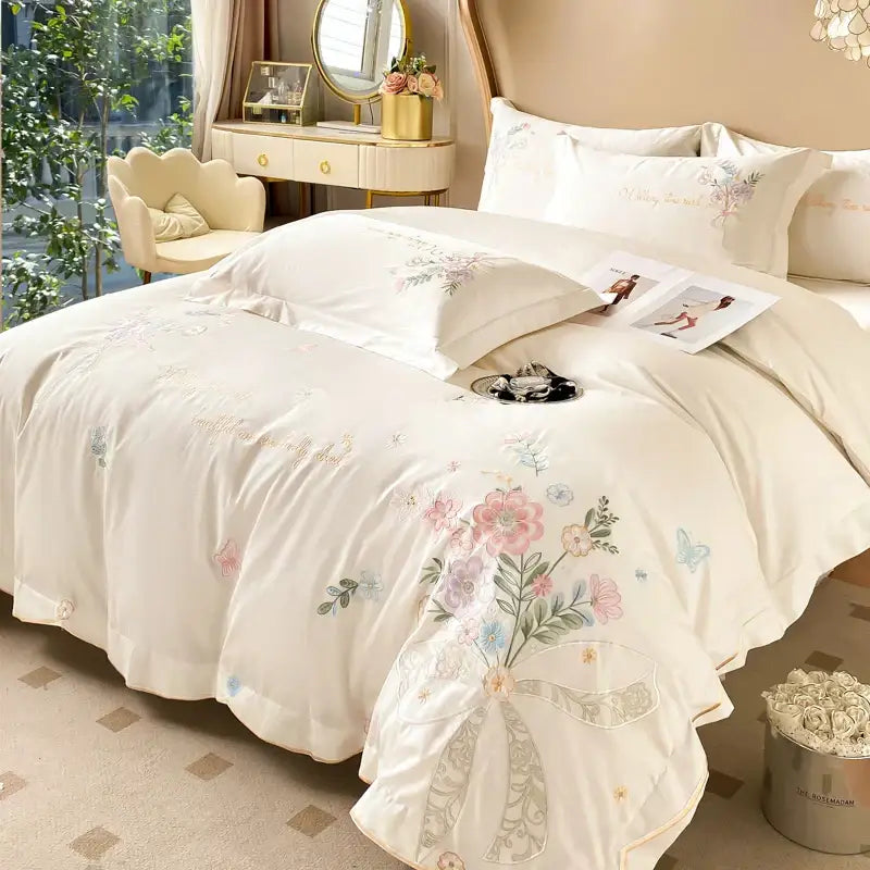 Cream-colored satin bedding set with chic flowers embroidery in soft pinks blues and greens by DecorBites™ 100% cotton 400TC