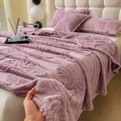 A lavender fleece throw blanket with a textured leaf pattern from decorbites chiffon butterfly jacquard collection