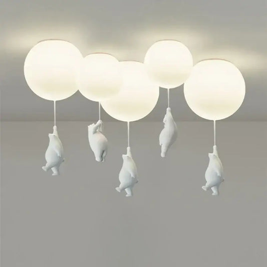 White bear astronaut ceiling chandelier with five spherical globes and dangling figurines for DecorBites children Nordic decor