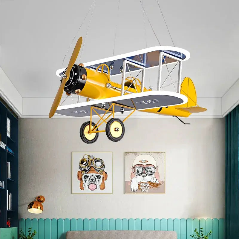 Yellow and black vintage-style biplane aircraft led chandelier with metallic accents for boys room decor