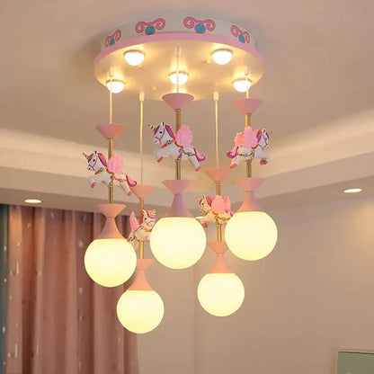 Pastel pink and white unicorn-themed decorbites children’s carousel led chandeliers with frosted glass shades for living room