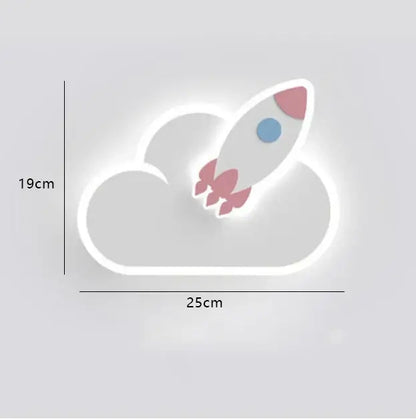 A glowing white led night light featuring a crown clouds rocket with pink fins on a cloud-shaped base for children