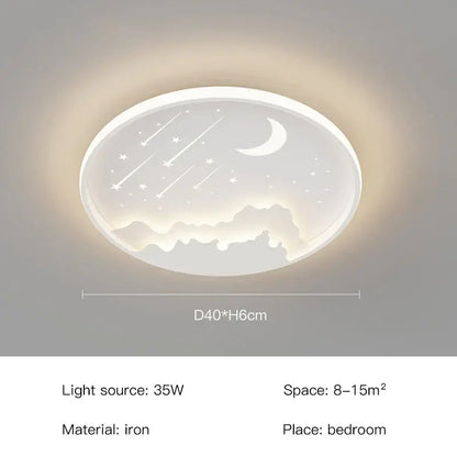 A soft white oval DecorBites™ room starry chandelier with blue white gold celestial stars and crescent moon design