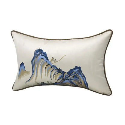 Cream-colored satin pillow cover with chinoiserie landscape embroidered design framed by dark brown piping
