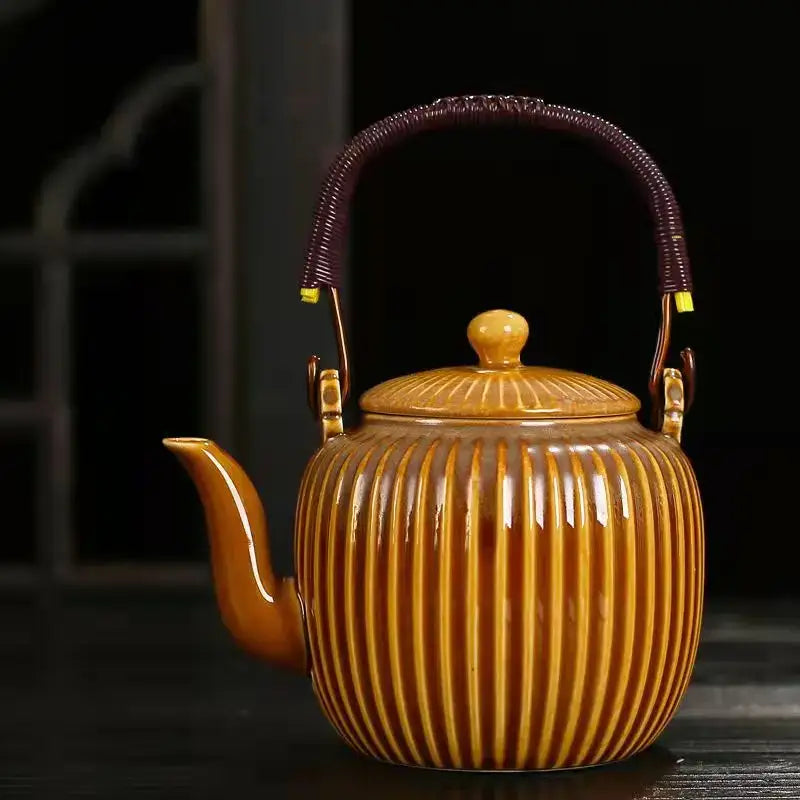 DecorBites™ ceramic teapot set in amber with vertical ridges dark purple handle and gold-toned accents for puer tea
