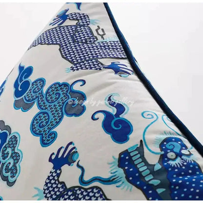 Decorbites™ triangular pillow cover in cream velvet with blue teal dragon motif ideal for city landscape decor