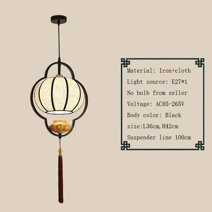 Black iron and cloth pendant light with a golden lotus and dark tassel for elegant tea house and bedroom decor