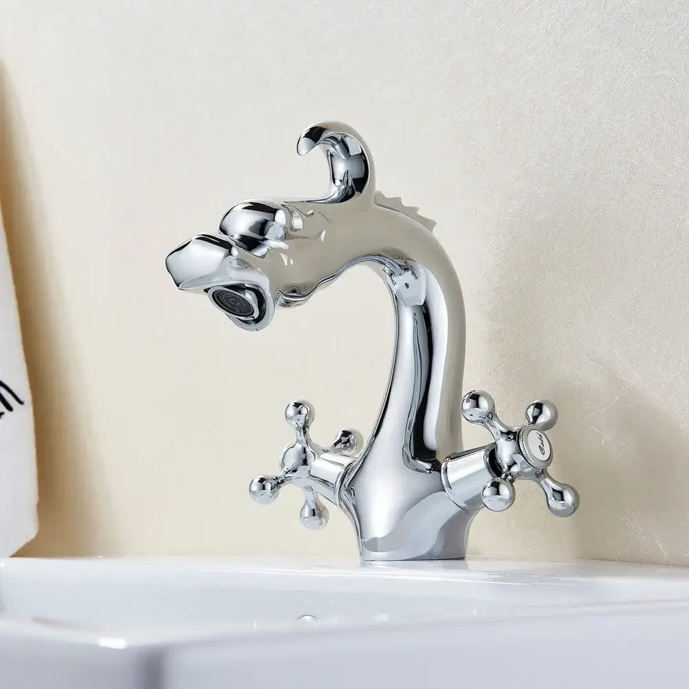Chrome-finished basin faucet with dragon crystal handle and ornate cross handles for dual hot cold deck mounting